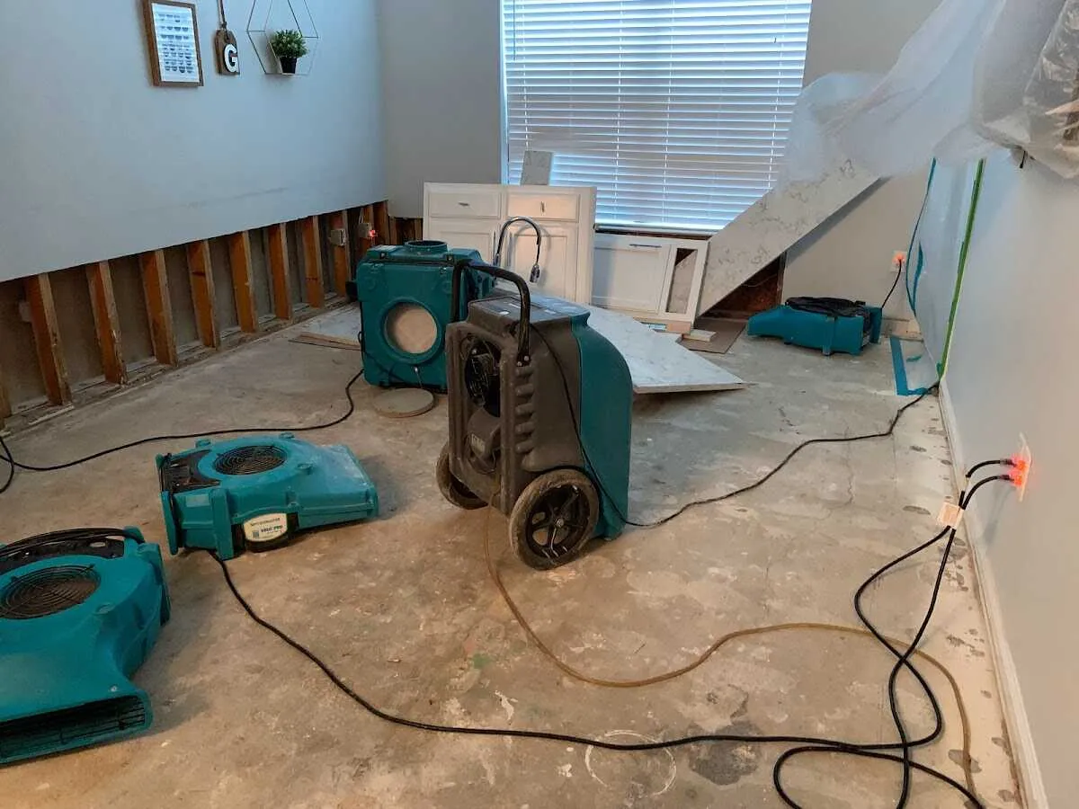 Dehumidifier in flood-cut room for Water Damage Restoration in Dallas