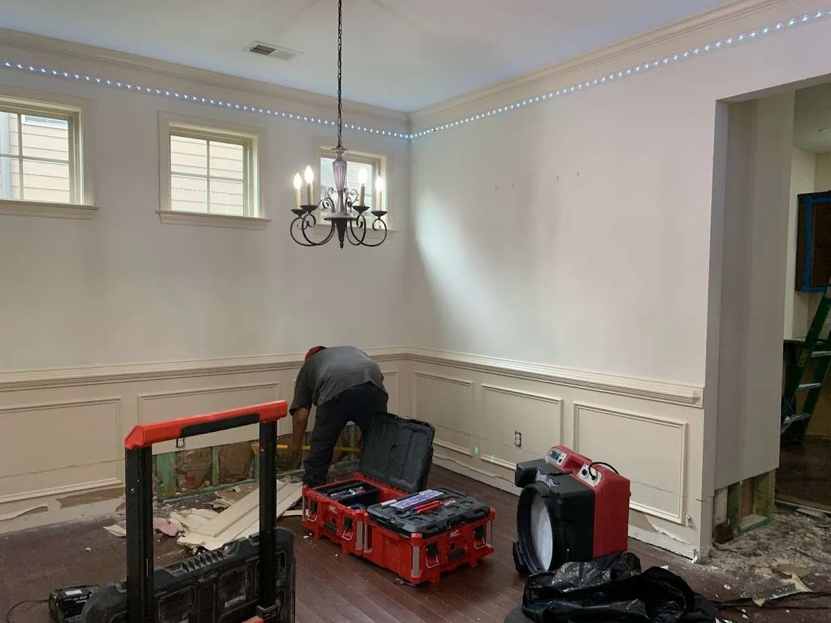 Restoration technician with professional equipment in Dallas